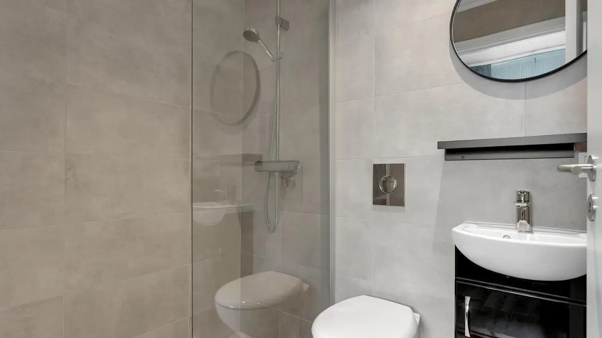 Private bathroom with shower in a room at NN Urban Guesthouse